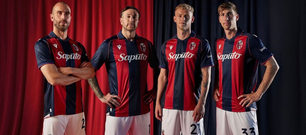 La maglia Home del Bologna per la stagione 2026/27 celebra i 100 anni dello stadio Dall'Ara, grande protagonista la Torre di Maratona